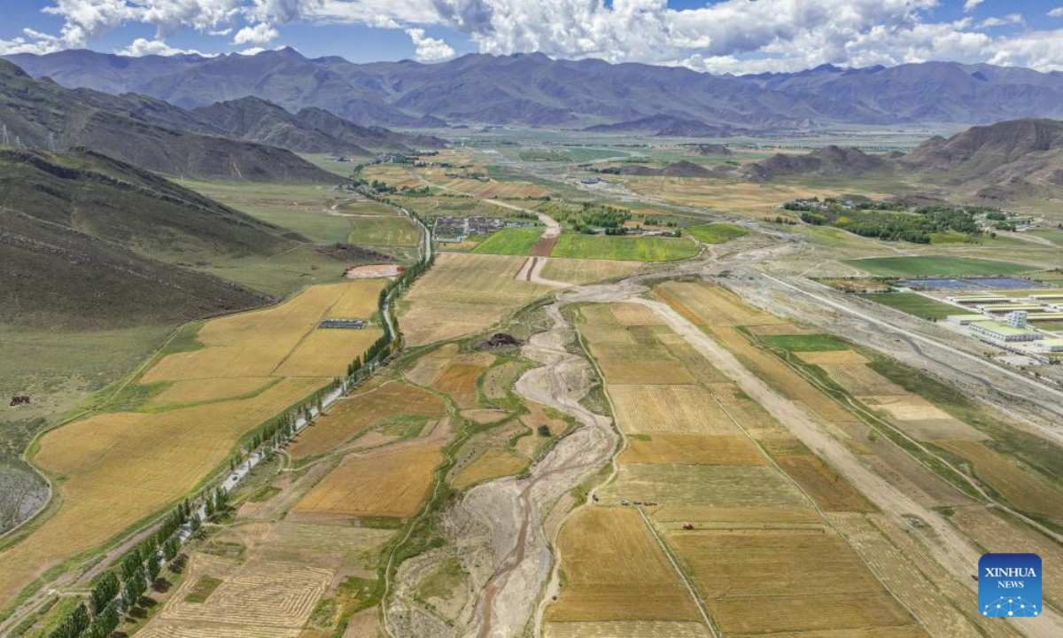 This aerial drone photo taken on Sept. 23, 2025 shows a field of highland barley to be harvested in Lhunzhub County, in Lhasa, southwest China's Xizang Autonomous Region, Sept. 23, 2025. The Chinese farmers' harvest festival is the first national festival created specifically for the country's farmers. Starting in 2018, the festival coincides with the Autumnal Equinox each year, which is one of the 24 solar terms of the Chinese lunisolar calendar and usually falls between Sept. 22 and 24 during the country's agricultural harvest season. (Xinhua/Tenzin Nyida)