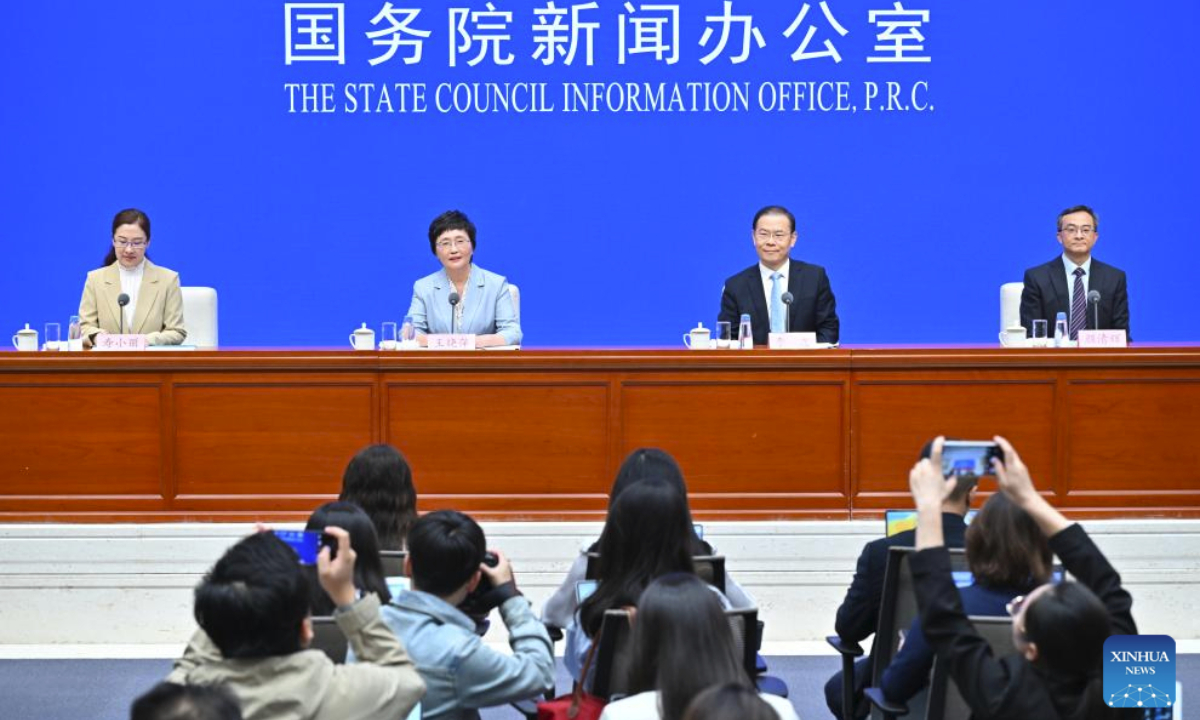 Minister of Human Resources and Social Security Wang Xiaoping (2nd L, back) attends a press conference held by the State Council Information Office (SCIO) on achievements in high-quality development of employment and social security in the 14th Five-Year Plan period (2021-2025) in Beijing, capital of China, Sept. 26, 2025. (Xinhua/Li Xin)