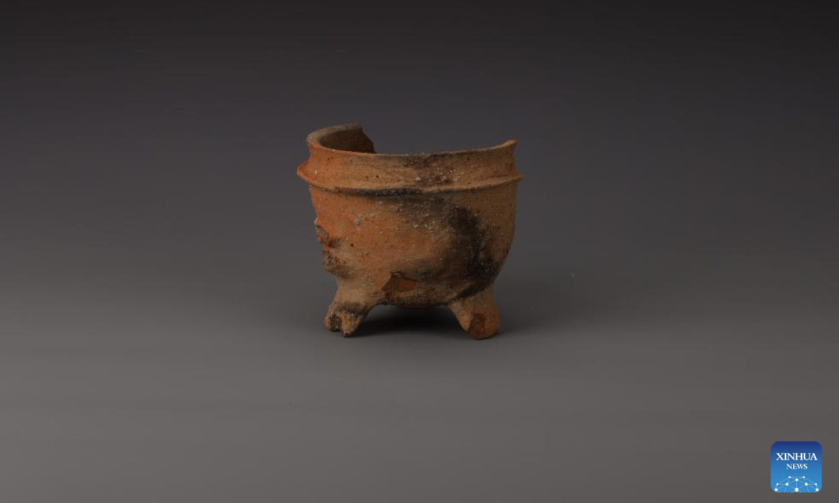 An undated file photo shows a piece of pottery from the Majiabang Culture of the Neolithic Age unearthed at the Doushan city site. (Jiangsu provincial institute of cultural relics and archaeology/Handout via Xinhua)
