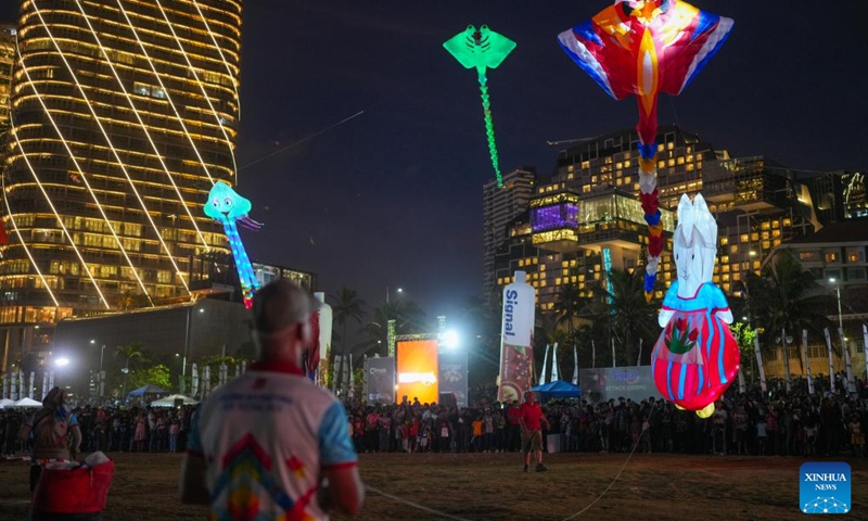 Participants fly illuminated kites during the Colombo International Kite Festival in Colombo, Sri Lanka, Aug. 24, 2025. (Xinhua)