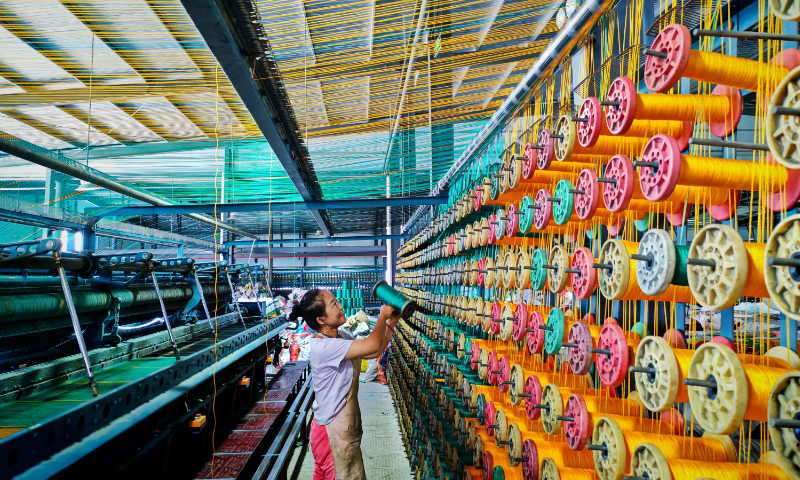A worker crafts fishing nets at a net product company in Wudi county, East China's Shandong Province, on September 7, 2025. The company produces more than 20 types of nets, including oyster and crab cage nets, with an annual output exceeding 10 million units. This year, the company's market share reached a new high, capturing 70 percent of the South Korean market. Photo: VCG