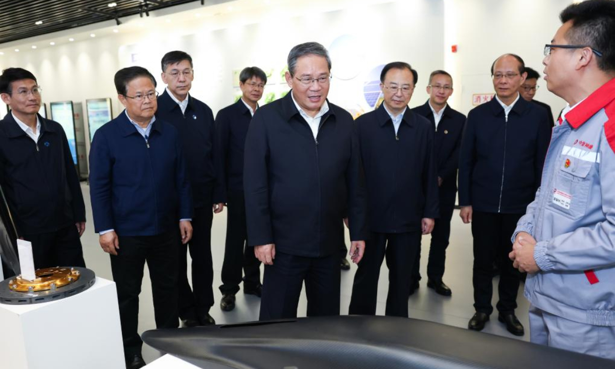 Chinese Premier Li Qiang, also a member of the Standing Committee of the Political Bureau of the Communist Party of China Central Committee, is briefed on local ecological protection efforts as well as the utilization of green power and computing capacity in Xining, northwest China's Qinghai Province, Sept. 16, 2025. Li made an inspection tour of northwest China's Gansu and Qinghai provinces from Monday to Tuesday. (Xinhua/Huang Jingwen)