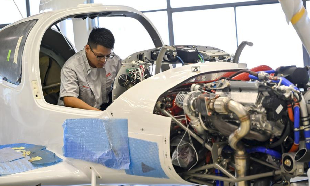 A worker assembles a general aviation aircraft at the workshop of CETC Wuhu Diamond Aircraft Manufacture Co., Ltd. in Wuhu City, east China's Anhui Province, July 3, 2025. (Xinhua/Zhang Cheng)