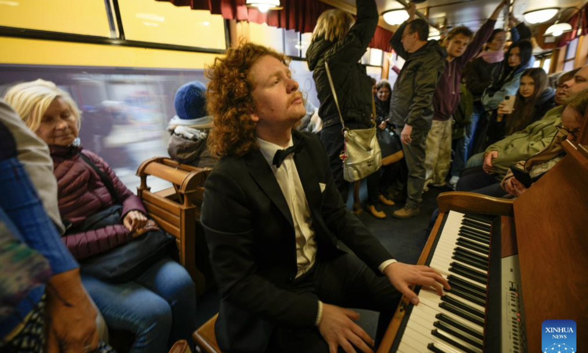 A pianist plays works by Frederic Chopin for passengers on a Chopin Tram in Warsaw, Poland, Oct. 9, 2025. The Chopin Tram is a public cultural initiative launched in Warsaw during the International Fryderyk Chopin Piano Competition. Passengers can enjoy live performances of Chopin's music during the ride, turning the city's tram into a moving concert hall.
The 19th International Fryderyk Chopin Piano Competition is currently underway in Warsaw and will run until Oct. 23. (Photo by Jaap Arriens/Xinhua)