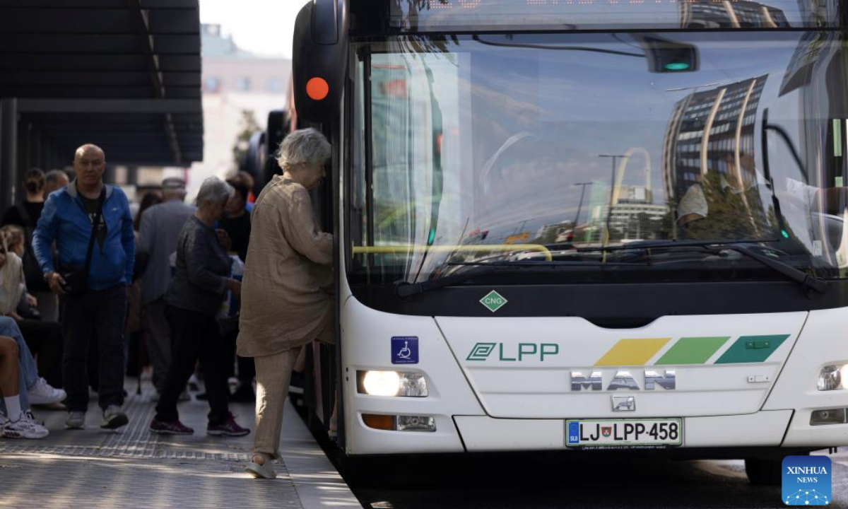 People use public transportation on World Car Free Day in Ljubljana, Slovenia, Sept. 22, 2025. (Photo by Zeljko Stevanic/Xinhua)