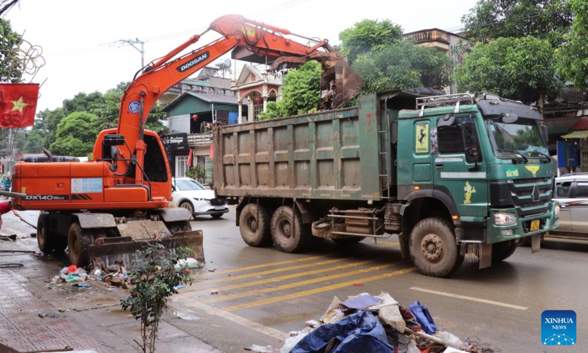People do cleanup work in Tuyen Quang province, Vietnam, Oct. 3, 2025. Typhoon Bualoi and ensuing floods and landslides have killed 51 people, left 14 others missing and injured 164 across northern and central Vietnam, with preliminary economic losses estimated at nearly 15.9 trillion Vietnamese dong (about 608 million U.S. dollars), the Vietnam Disaster and Dyke Management Authority said in a report on Friday. (VNA via Xinhua)