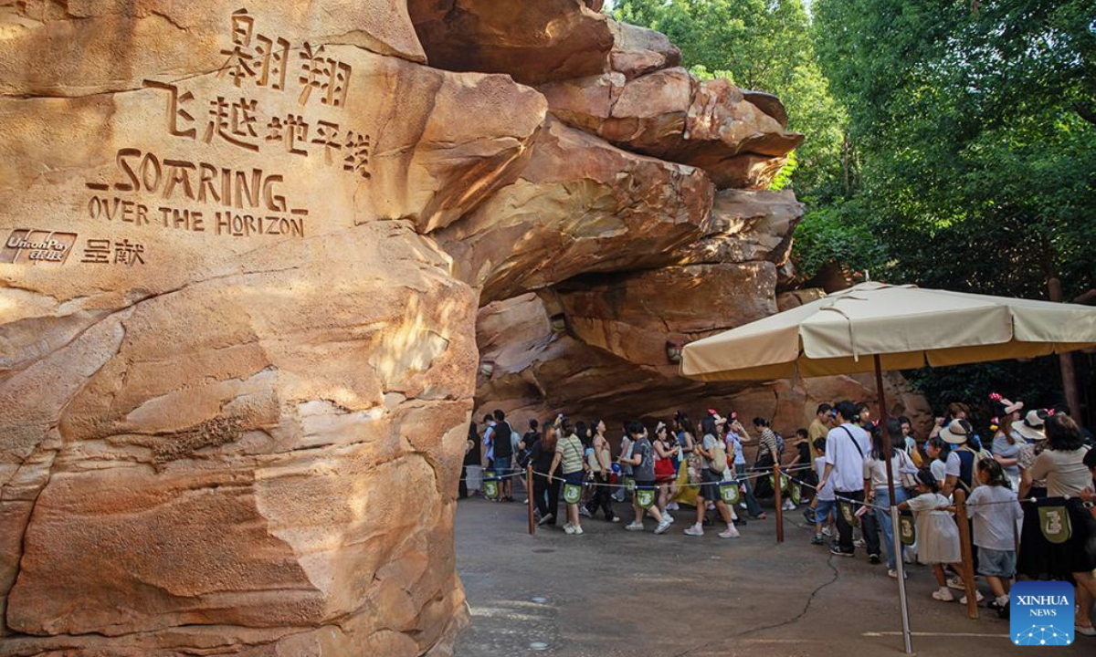 Tourists wait in line at Shanghai Disney Resort's iconic attraction, Soaring Over the Horizon, in Shanghai, east China, Sept. 19, 2025. (Xinhua)