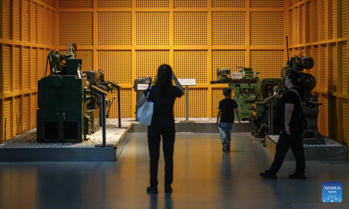 Tourists visit the Industrial Museum of China in Shenyang, northeast China's Liaoning Province, Oct. 1, 2025. Many industrial heritages in Shenyang of northeast China's Liaoning Province have been transformed into public leisure spaces, creative industry parks, and distinctive neighborhoods, offering citizens and tourists unique experiences during this year's National Day and Mid-Autumn Festival holiday. (Xinhua/Pan Yulong)