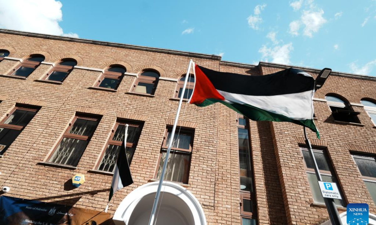 A Palestinian flag is seen at the gate of the Palestine Mission to the UK in London, Britain, Sept. 22, 2025. British Prime Minister Keir Starmer on Sunday announced that Britain has formally recognized the State of Palestine, affirming Britain's support for the right of the Palestinian people to self-determination and the two-state solution. (Xinhua/Zhao Jiasong)