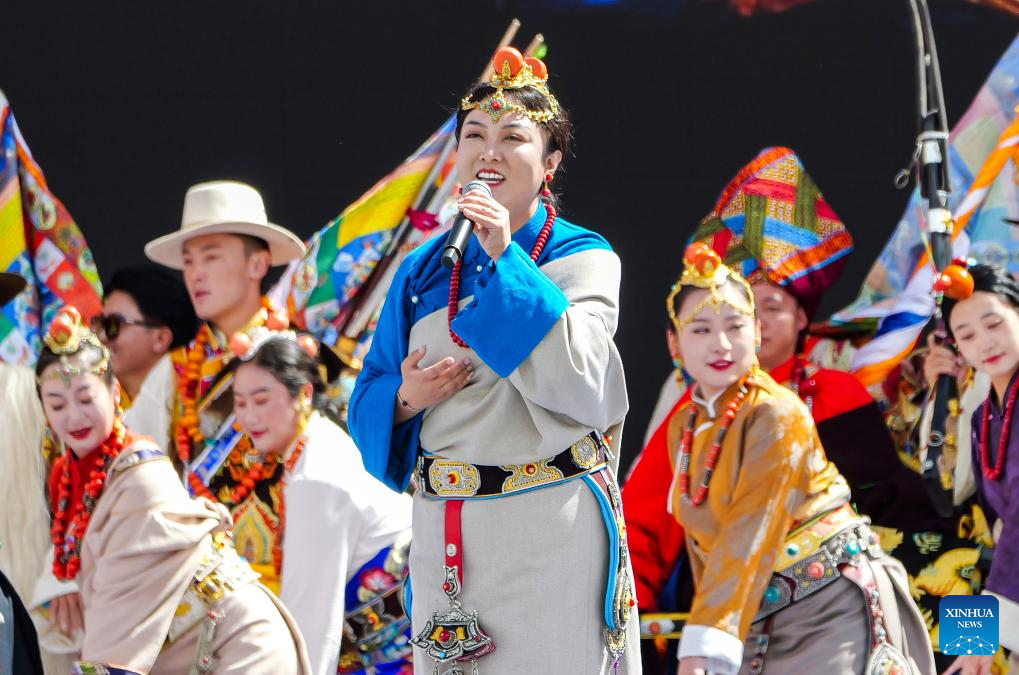 A singer sings during the opening ceremony of a culture and arts festival themed on the ancient Tea Horse Road in Qamdo, southwest China's Xizang Autonomous Region, Sept. 15, 2025. Qamdo used to be a key stop along the ancient Tea Horse Road, a trade route which dates back to the Tang Dynasty (618-907) and spans multiple regions. (Xinhua/Kelsang Namgyai)