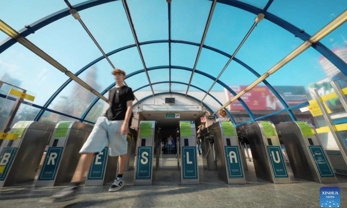 A man walks out of a central metro station in Warsaw, Poland on Sept. 22, 2025. Public transportation in Warsaw was free of charge for all passengers on World Car Free Day, part of the European Mobility Week to promote sustainable urban mobility. (Photo by Jaap Arriens/Xinhua)