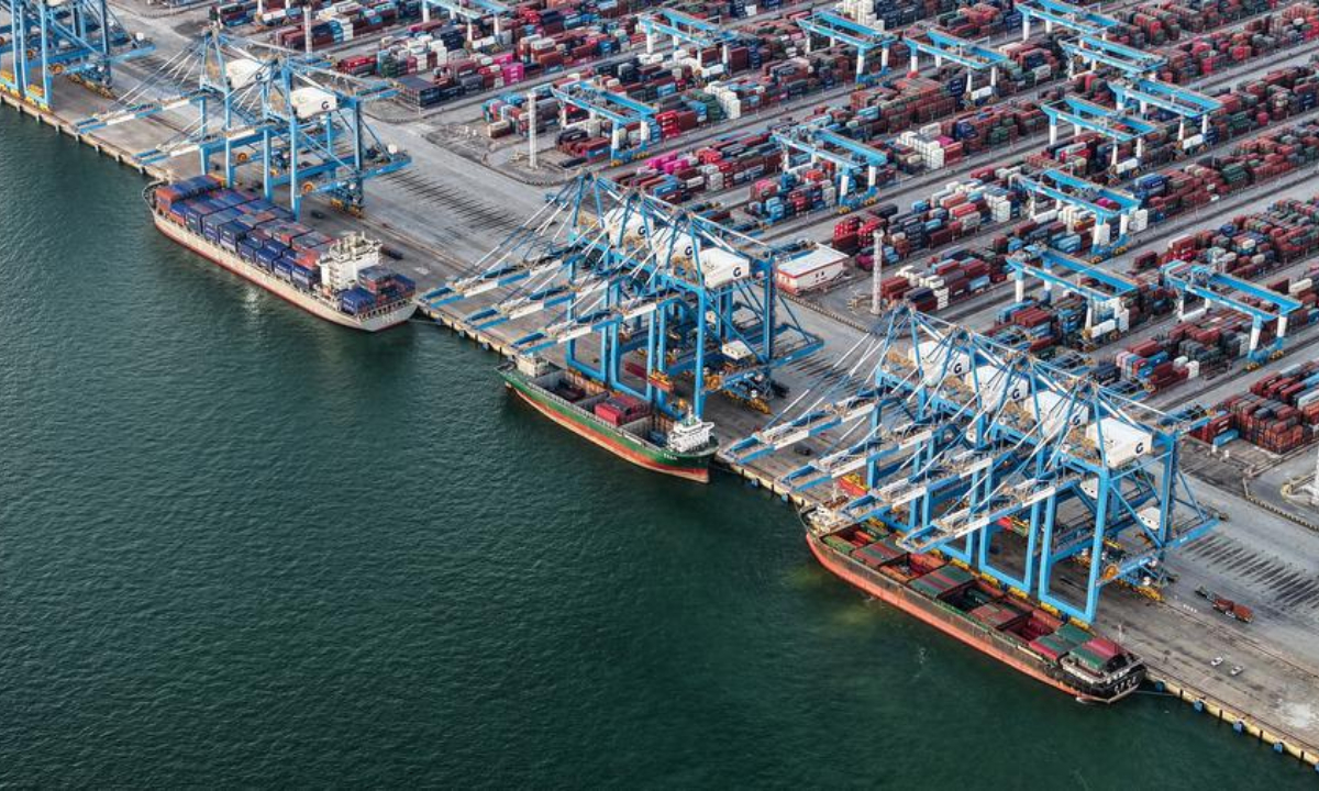 An aerial drone photo taken on Sept. 4, 2025 shows cargo ships berthed at a container dock of Qinzhou Port in Qinzhou City, south China's Guangxi Zhuang Autonomous Region. (Xinhua/Zhang Ailin)