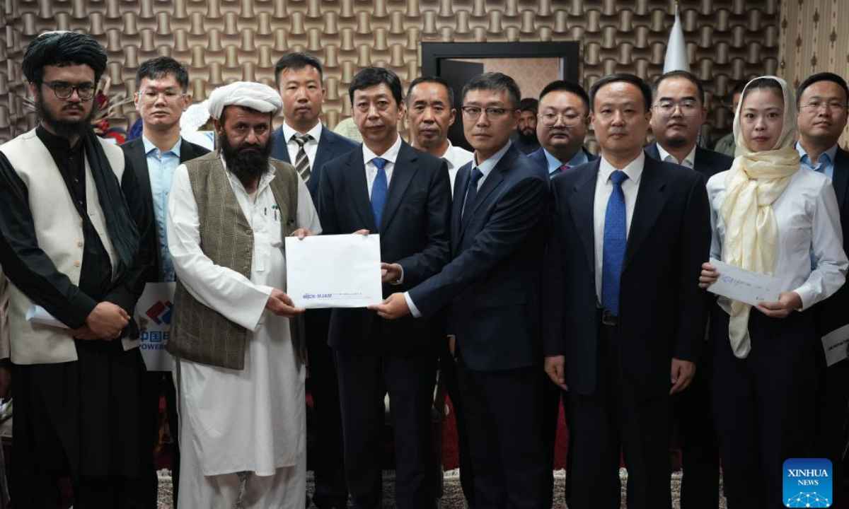 Chinese delegates hand over earthquake relief donations to Afghan delegates in Kabul, Afghanistan, Sept. 2, 2025. Bao Xuhui, charge d'affaires of the Chinese Embassy in Afghanistan, has met with Muhammad Alam Alamyar, general-director of administration of the Afghanistan National Disaster Management Authority, and handed over earthquake relief donations from the embassy, Chinese institutions and the Overseas Chinese Association. (Xinhua/Li Ang)