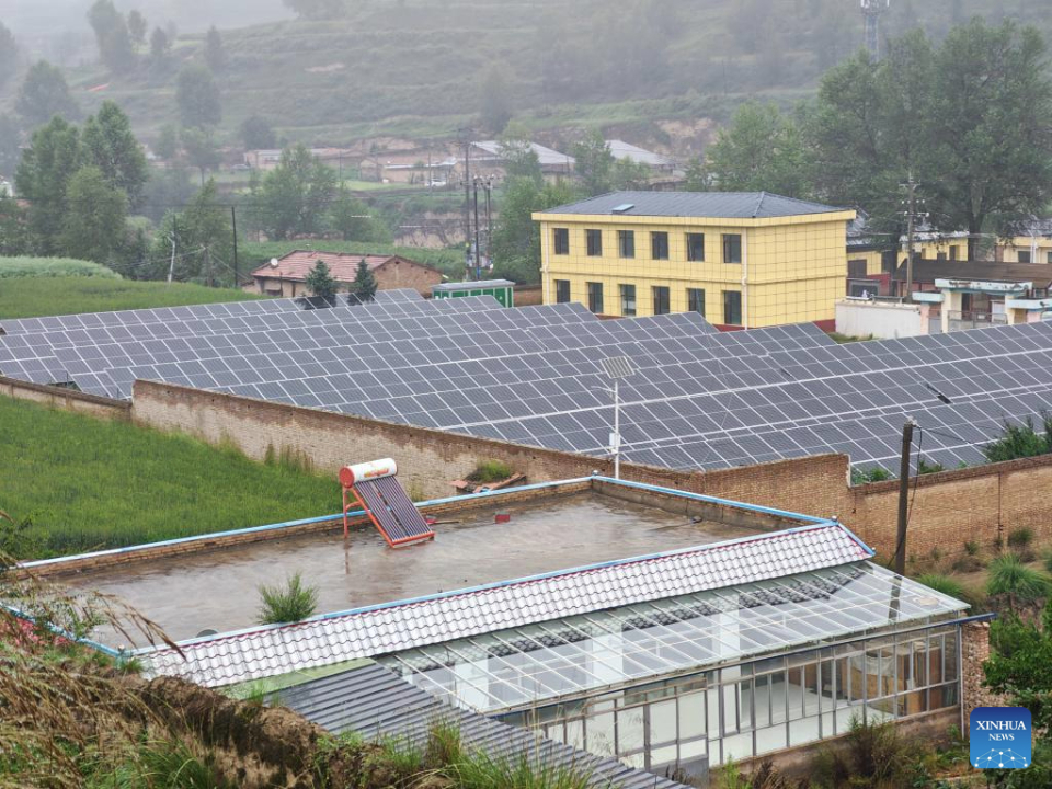 Rooftop solar panels are pictured in Huzhu Tu Autonomous County, northwest China's Qinghai Province, on Aug. 8, 2025.(Xinhua)