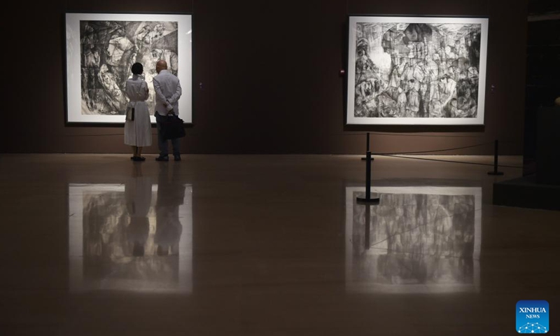 Visitors view paintings at the National Art Museum of China in Beijing, capital of China, Aug. 25, 2025.(Xinhua/Lu Peng)