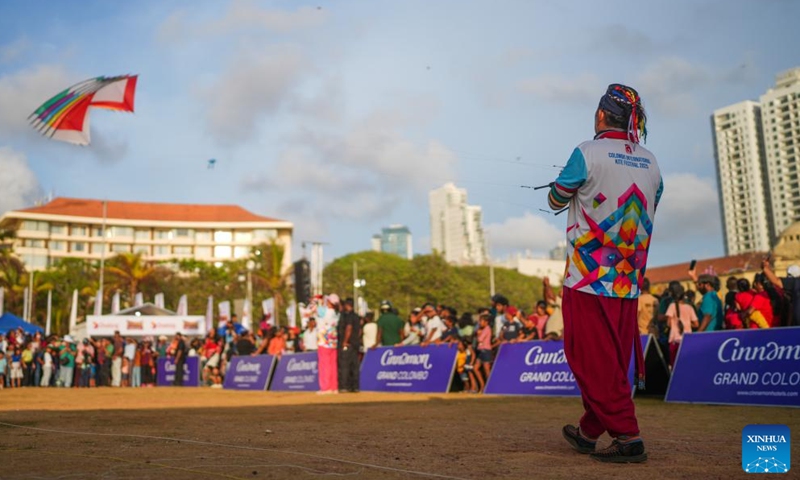 A man manipulates a kite at the Colombo International Kite Festival in Colombo, Sri Lanka, Aug. 24, 2025. (Photo by Thilina Kaluthotage/Xinhua)