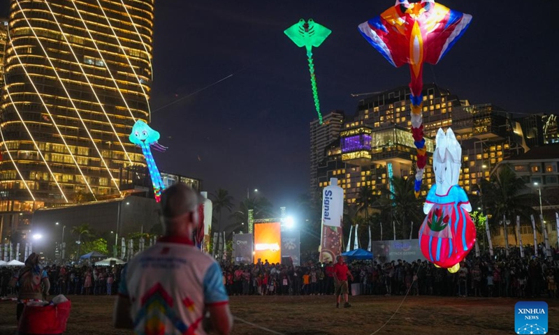 Participants fly illuminated kites during the Colombo International Kite Festival in Colombo, Sri Lanka, Aug. 24, 2025. (Photo by Thilina Kaluthotage/Xinhua)