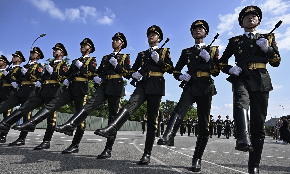 Soldiers from the People's Liberation Army march as they practice for an upcoming military parade to mark the 80th Anniversary of the end of World War II and Japan's surrender, at a military base on August 20, 2025 in Beijing, China. The parade will be held on September 3rd, and marks what is known in China as the Chinese People's War of Resistance Against Japanese Aggression and the World Anti-Fascist War.(Photo: VCG)