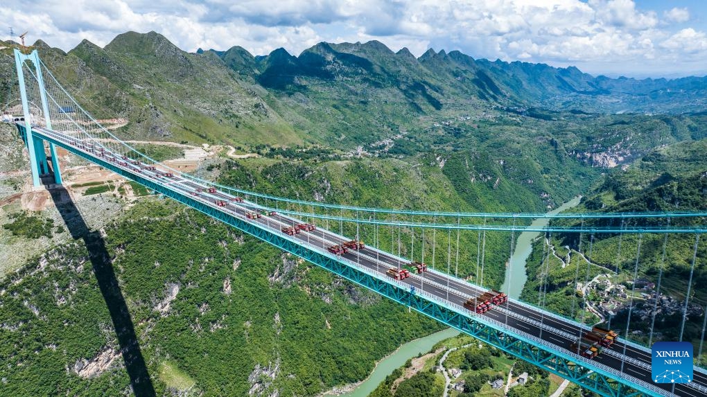 This aerial drone photo taken on Aug. 25, 2025 shows a load test on the Huajiang Grand Canyon Bridge in southwest China's Guizhou Province.(Xinhua/Tao Liang)
