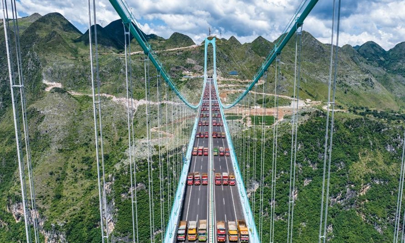This aerial drone photo taken on Aug. 25, 2025 shows a load test on the Huajiang Grand Canyon Bridge in southwest China's Guizhou Province. (Xinhua/Tao Liang)