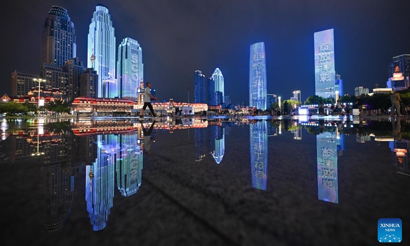 This photo taken on Aug. 22, 2025 shows a light show in celebration of the upcoming Shanghai Cooperation Organization (SCO) Summit 2025 at the square in front of the Tianjin Railway Station in north China's Tianjin. The SCO Summit 2025 will be held here from Aug. 31 to Sept. 1. (Xinhua/Sun Fanyue)