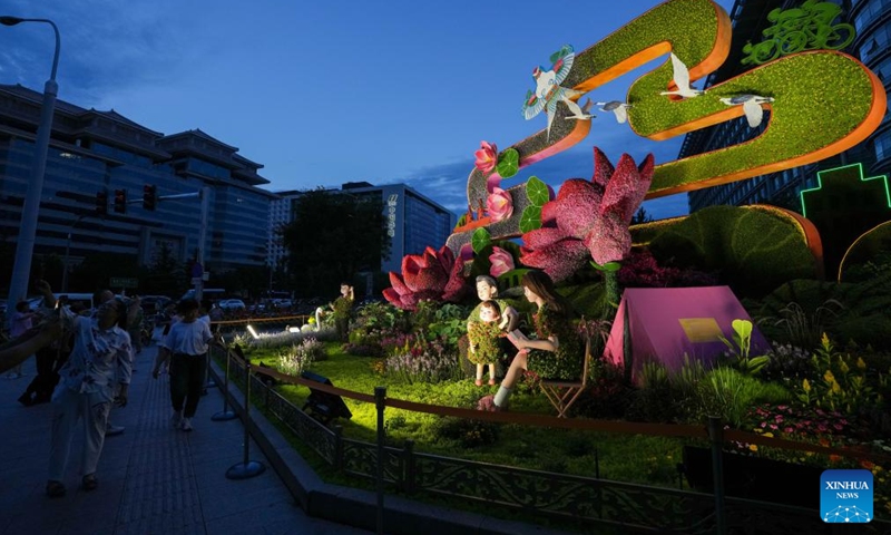 A set of floral installation is pictured at Xidan area in Beijing, capital of China, Aug. 22, 2025. Ten sets of floral installations along Chang'an Avenue marking the 80th anniversary of the victory in the Chinese People's War of Resistance Against Japanese Aggression and the World Anti-Fascist War have been completed. (Xinhua/Ju Huanzong)