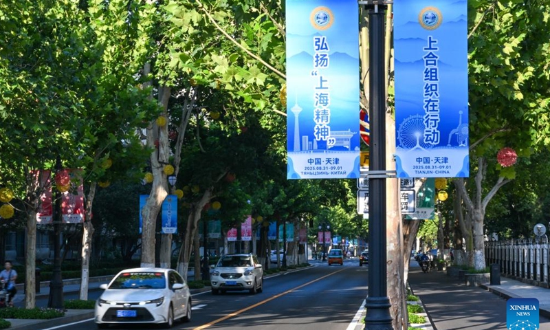 Banners marking the upcoming Shanghai Cooperation Organization (SCO) Summit 2025 are pictured on a street in north China's Tianjin, Aug. 25, 2025. The SCO Summit 2025 will be held here from Aug. 31 to Sept. 1. (Xinhua/Sun Fanyue)