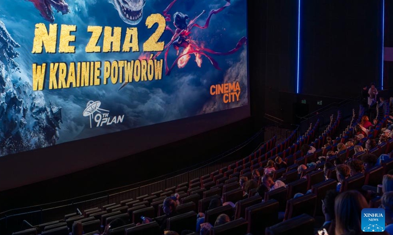 Audience wait for the screening of the Chinese animated film Ne Zha 2 during a preview event at a cinema in Warsaw, Poland, on Aug. 26, 2025. The film is scheduled for official release in Poland on Aug. 29. (Xinhua/Xia Yuanyi)