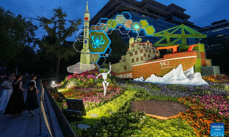 A set of floral installation is pictured at Xidan area in Beijing, capital of China, Aug. 22, 2025. Ten sets of floral installations along Chang'an Avenue marking the 80th anniversary of the victory in the Chinese People's War of Resistance Against Japanese Aggression and the World Anti-Fascist War have been completed. (Xinhua/Ju Huanzong)