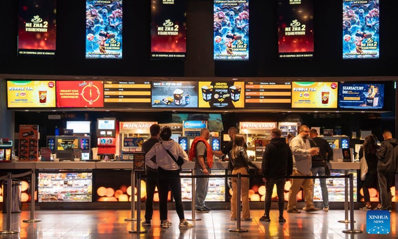 Posters of the Chinese animated film Ne Zha 2 are displayed at the ticketing area of a cinema in Warsaw, Poland on Aug. 26, 2025. The film is scheduled for official release in Poland on Aug. 29. (Xinhua/Xia Yuanyi)