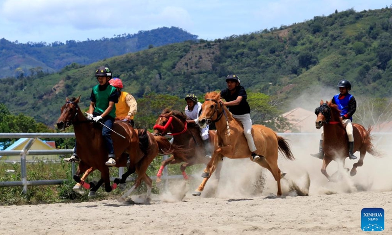 Teenage jockeys compete during a traditional horse race in Takengon, Aceh Province, Indonesia, Aug. 26, 2025. (Photo by Yulham/Xinhua)