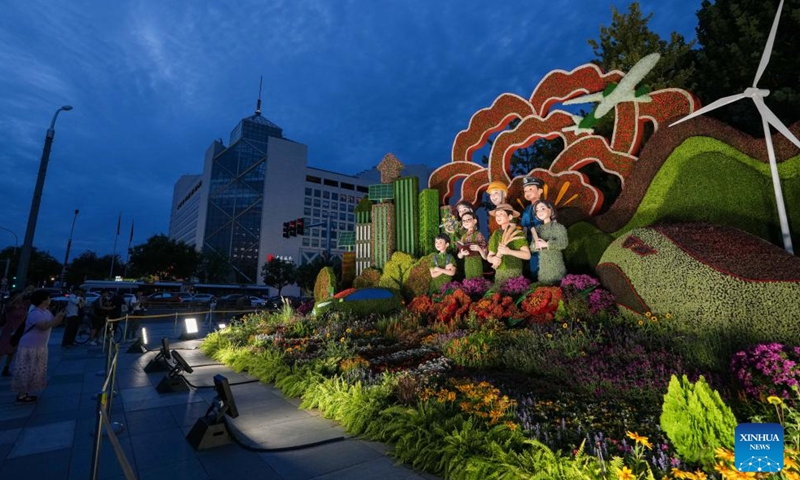 A set of floral installation is pictured at Xidan area in Beijing, capital of China, Aug. 22, 2025. Ten sets of floral installations along Chang'an Avenue marking the 80th anniversary of the victory in the Chinese People's War of Resistance Against Japanese Aggression and the World Anti-Fascist War have been completed. (Xinhua/Ju Huanzong)