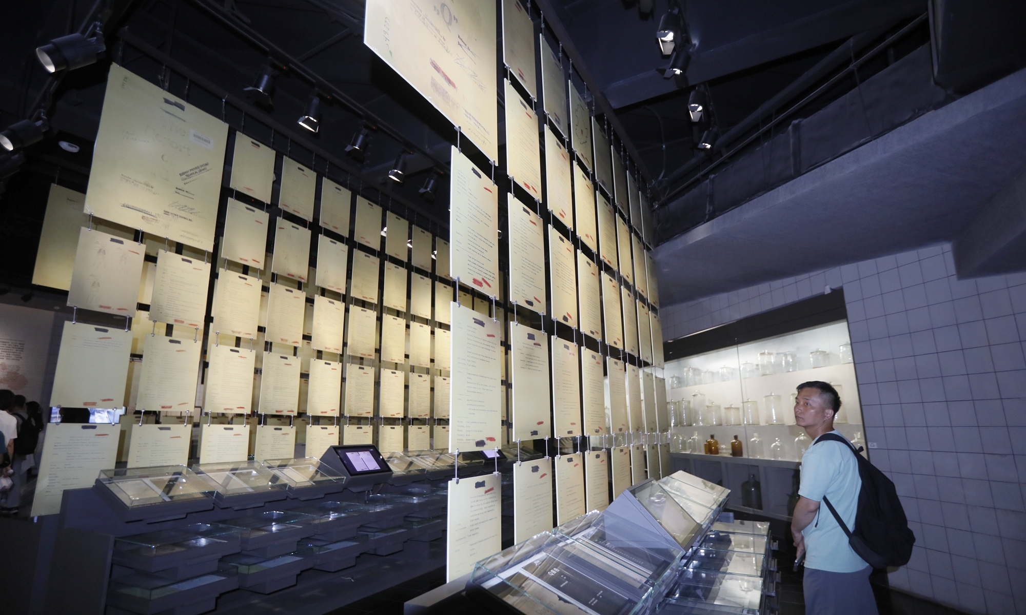 A visitor reads documents at the Exhibition Hall of Evidences of Crime Committed by Unit 731 of the Japanese Imperial Army in Harbin, Northeast China's Heilongjiang Province, on July 1, 2025. Photo: VCG