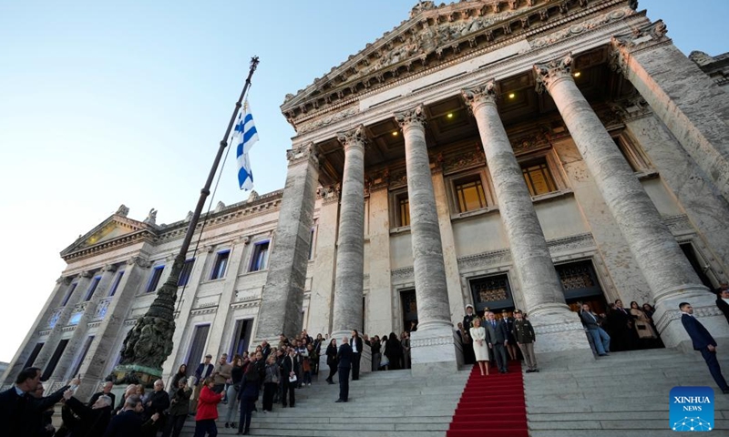 People attend a ceremony at the Legislative Palace after the concert of the bicentennial celebrations in Montevideo, Uruguay, on Aug. 25, 2025. Uruguay celebrated its 200th anniversary of the declaration of independence on Monday. (Photo by Nicolas Celaya/Xinhua)