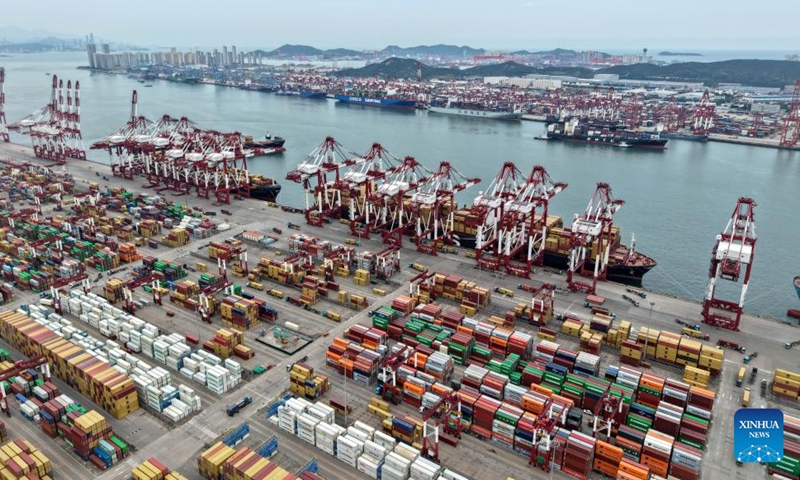 An aerial drone photo taken on Aug. 26, 2025 shows a view of Qingdao Port in Qingdao, east China's Shandong Province. (Xinhua/Li Ziheng)