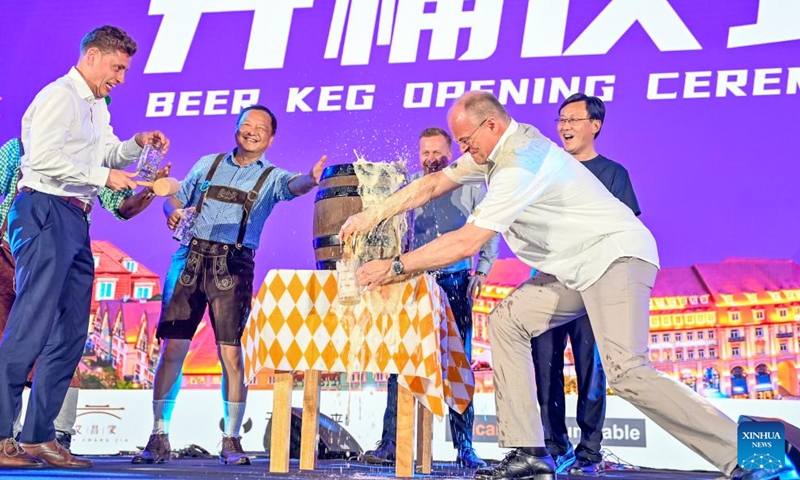 Guests attend the opening ceremony of the 20th Taicang Rothenburg beer festival in Taicang City, east China's Jiangsu Province, Aug. 26, 2025.The festival kicked off here on Tuesday. (Photo by Wang Xuzhong/Xinhua)