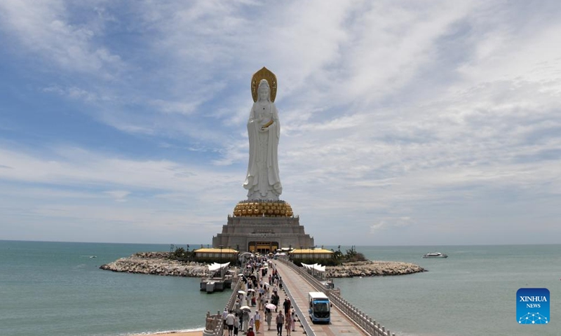 Tourists visit the Nanshan Cultural Tourism Zone in Sanya, south China's Hainan Province, Aug. 27, 2025. After Typhoon Kajiki swept through, Sanya City has been moving swiftly to restore its tourism market. (Xinhua/Zhao Yingquan)