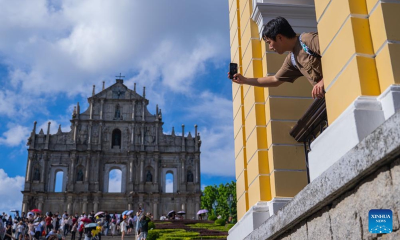 Tourists visit the Ruins of St. Paul's in south China's Macao, Aug. 21, 2025. Photo: Xinhua