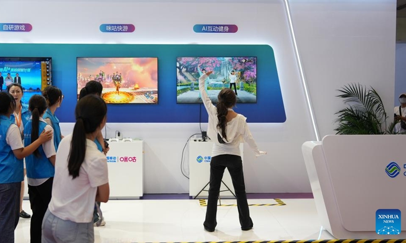 A visitor experiences AI interaction program during the 15th China International Digital Publishing Expo in Zhengzhou, central China's Henan Province, Aug. 28, 2025. Themed Achieving a Smart Future Through Digital-Real Convergence, the 15th China International Digital Publishing Expo kicked off in Zhengzhou on Thursday. Photo: Xinhua