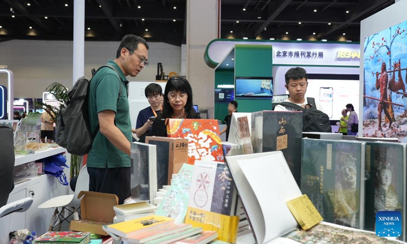 Visitors are seen during the 15th China International Digital Publishing Expo in Zhengzhou, central China's Henan Province, Aug. 28, 2025. Themed Achieving a Smart Future Through Digital-Real Convergence, the 15th China International Digital Publishing Expo kicked off in Zhengzhou on Thursday. Photo: Xinhua