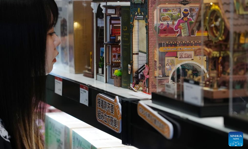 A visitor looks at toys exhibited at the International Tokyo Toy Show 2025 in Tokyo, Japan, Aug. 28, 2025. The toy show kicked off here on Thursday, attracting 210 exhibitors with around 35,000 items on display. Photo: Xinhua