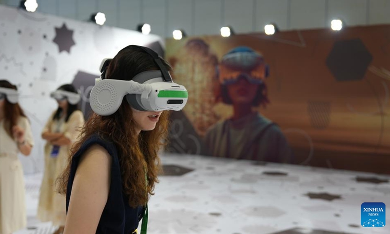 A visitor watches an extended reality (XR) movie during the 15th China International Digital Publishing Expo in Zhengzhou, central China's Henan Province, Aug. 28, 2025. Themed Achieving a Smart Future Through Digital-Real Convergence, the 15th China International Digital Publishing Expo kicked off in Zhengzhou on Thursday. Photo: Xinhua