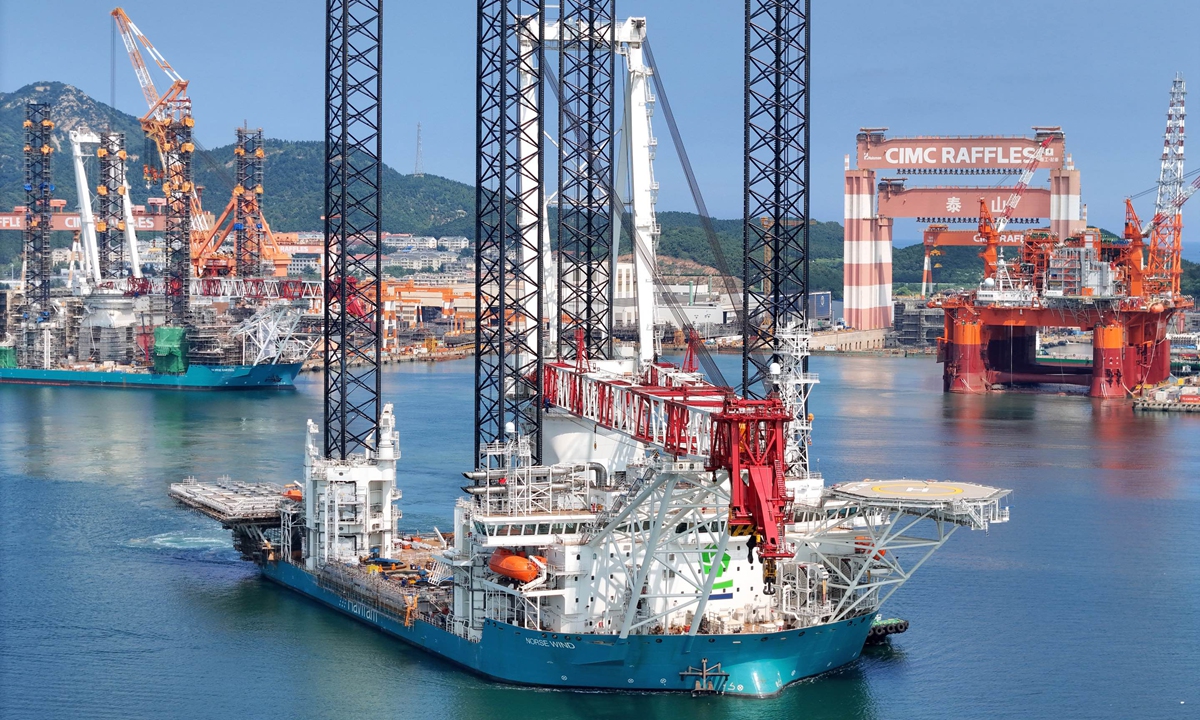 An offshore wind power installation vessel departs for sea trials at the CIMC Raffles construction base in Yantai, East China's Shandong Province, on August 29, 2025. By the end of 2024, China's cumulative offshore wind power capacity connected to the national grid reached 41.27 gigawatts, accounting for 49.6 percent of the global total. Photo: VCG