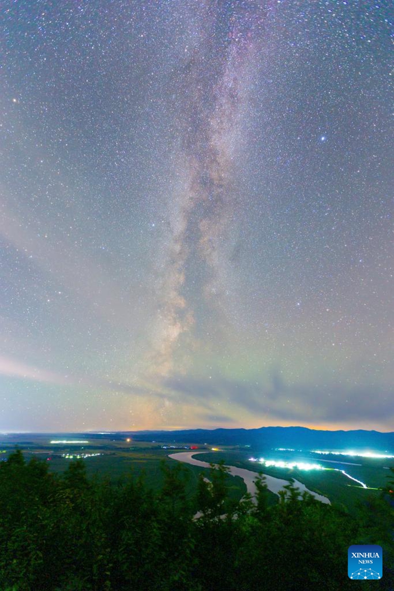 The Milky Way and the Altair and Vega stars on both sides are pictured in Tangyuan County, Jiamusi City of northeast China's Heilongjiang Province, on Aug. 24, 2025. Known as the Chinese version of the Valentine's Day, the Qixi Festival fell on Friday this year.

The festival, celebrated on the seventh day of the seventh month on the Chinese lunar calendar, originated from an ancient Chinese love story.

The stars Altair and Vega, regarded as Niu Lang (a humble cowherd) and Zhi Nyu (the seventh daughter of the Goddess of Heaven) , were beloved couple in the legend who found their love forbidden and were separated to opposite sides of the Milky Way.

Moved by their plight, magpies intervened, creating the bridge with their wings on the seventh night of the seventh month of China's lunar calendar, allowing the couple to reunite for just one day each year. Photo: Xinhua