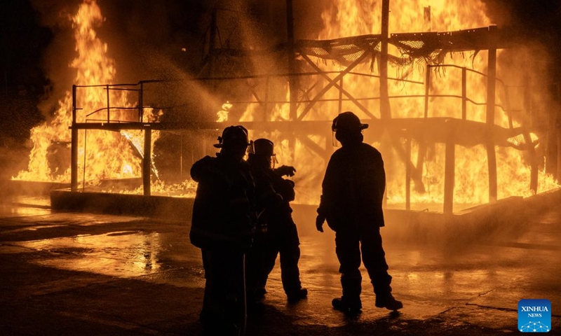 Firefighters take part in a training session at Modderfontein Firefighter Training Centre in Johannesburg, South Africa, on Aug. 29, 2025. (Photo: Xinhua)
