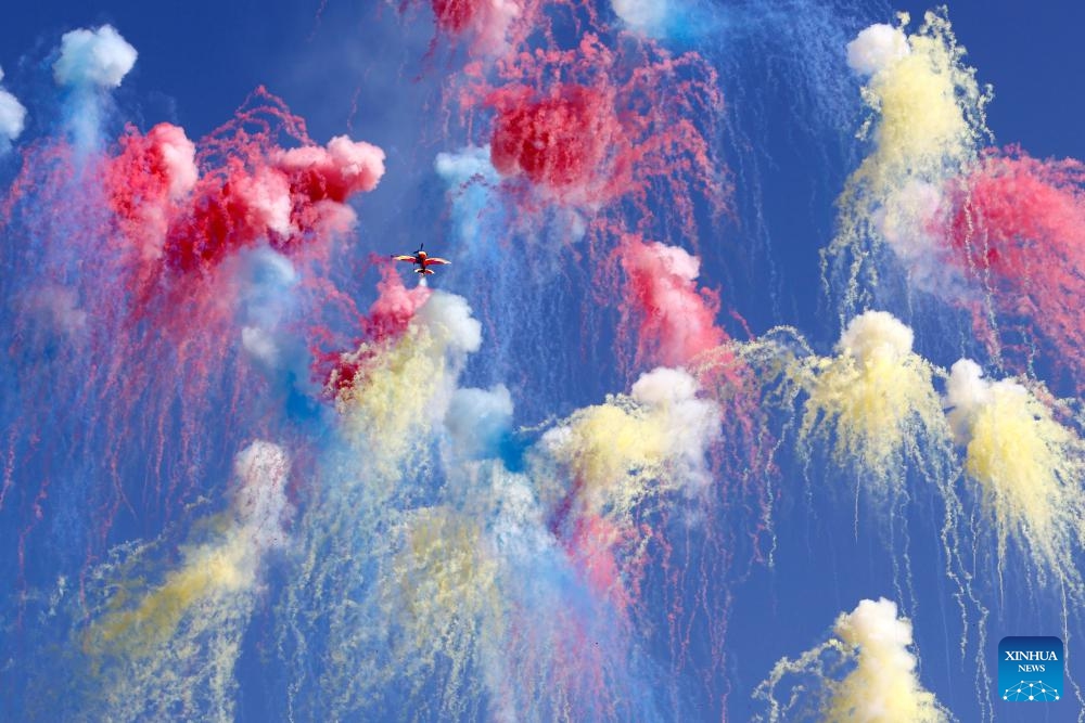 Members of Hawks of Romania aerobatic team perform on Extra-330 airplanes during the Bucharest International Air Show 2025 (BIAS), held at Baneasa airfield in Bucharest, Romania, Aug. 30, 2025. Over 100 civil and military aircraft, as well as over 200 pilots and paratroopers participate in the 15th edition of BIAS, Romania's largest air show. (Photo: Xinhua)