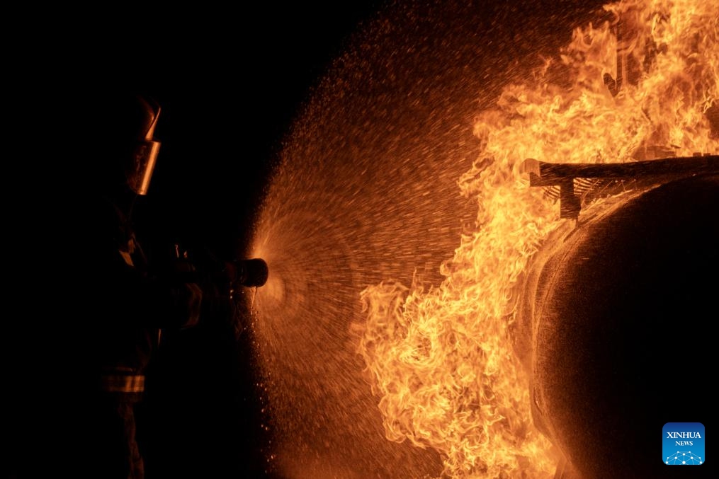 A firefighter takes part in a training session at Modderfontein Firefighter Training Centre in Johannesburg, South Africa, on Aug. 29, 2025. (Photo: Xinhua)