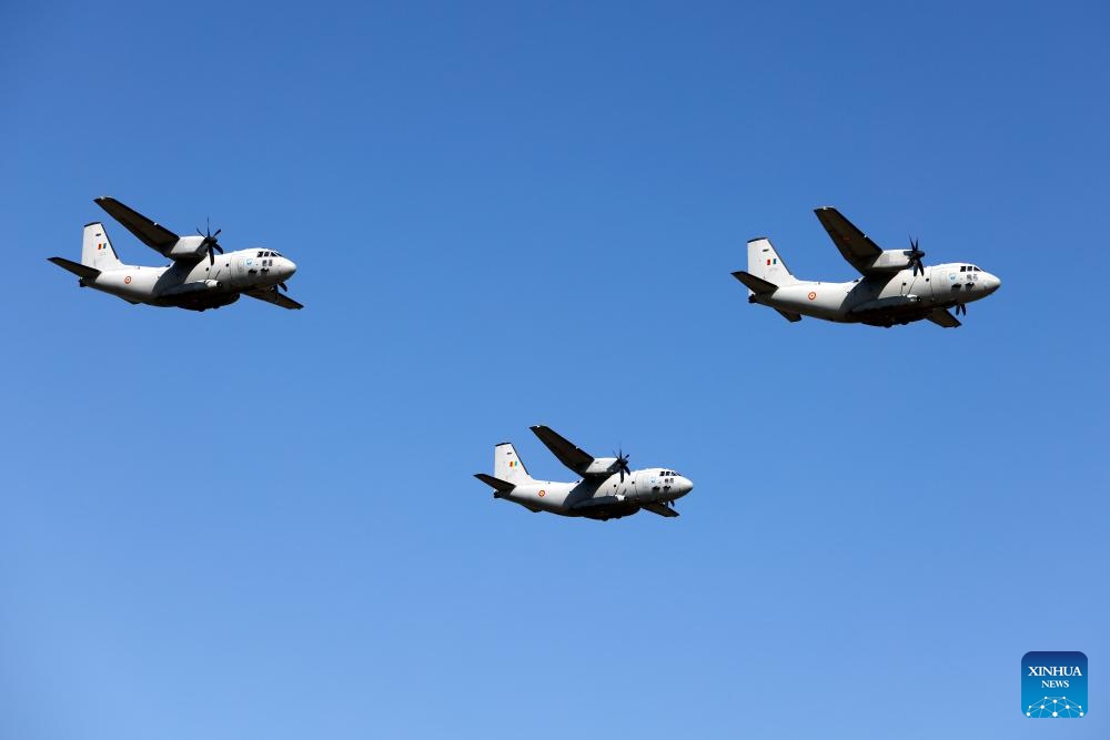 Romanian Air Force pilots perform on C-27J Spartan transport airplanes during the Bucharest International Air Show 2025 (BIAS), held at Baneasa airfield in Bucharest, Romania, Aug. 30, 2025. Over 100 civil and military aircraft, as well as over 200 pilots and paratroopers participate in the 15th edition of BIAS, Romania's largest air show. (Photo: Xinhua)