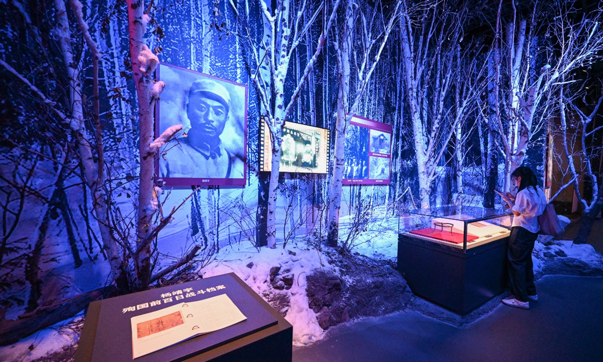A visitor explores the special exhibition featuring artifacts excavated from sites associated with the Northeast United Resistance Army held at the Museum of the Communist Party of China in Beijing on August 30, 2025. Photo: Chen Tao/GT
