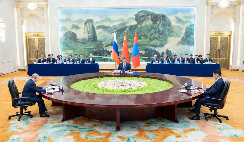 Chinese President Xi Jinping, Russian President Vladimir Putin and Mongolian President Ukhnaa Khurelsukh hold a trilateral meeting at the Great Hall of the People in Beijing, capital of China, Sept. 2, 2025. (Xinhua/Ding Haitao)